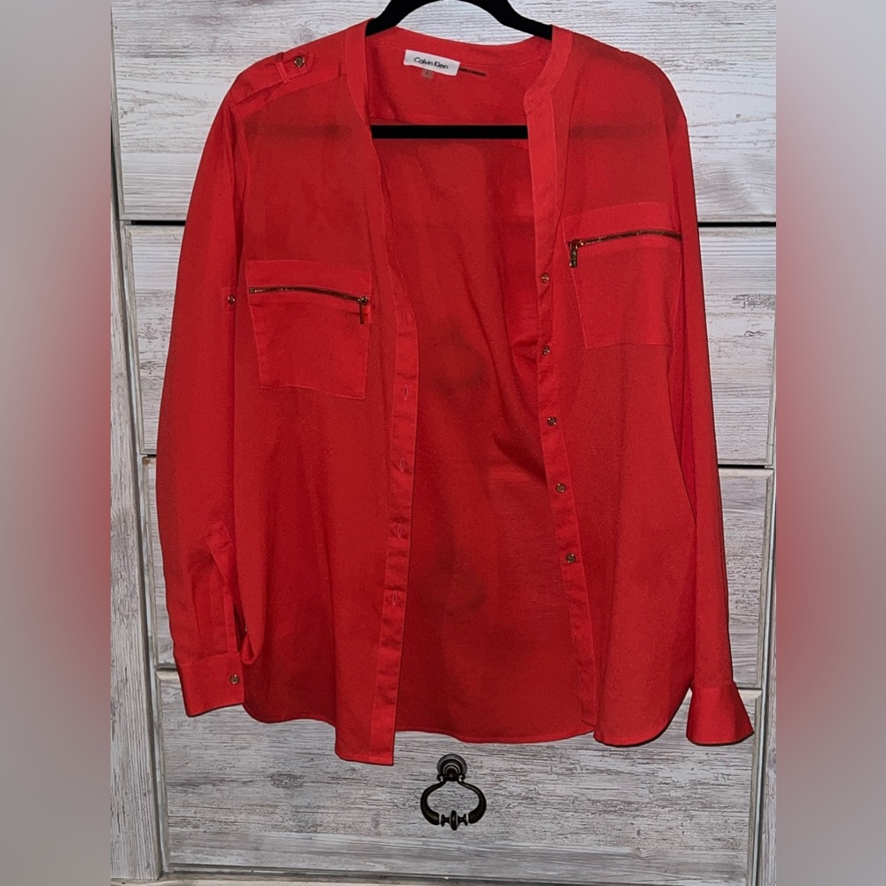 Calvin Klein button down blouse.